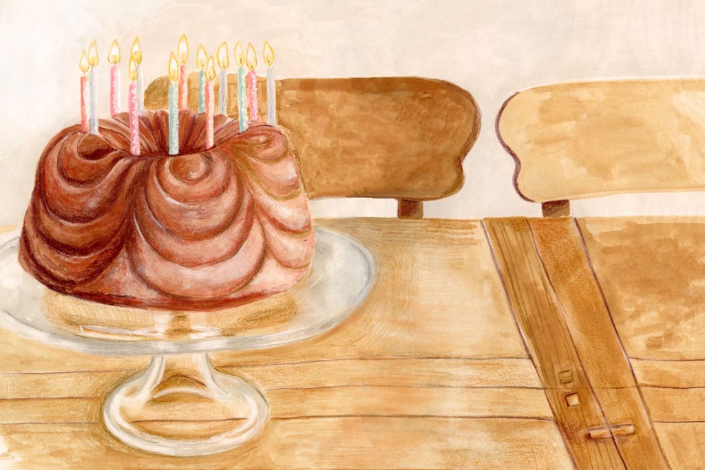 A painting of a crisp browned bunt cake on a glass cake standing, with colourful birthday candles ready to be blown out.